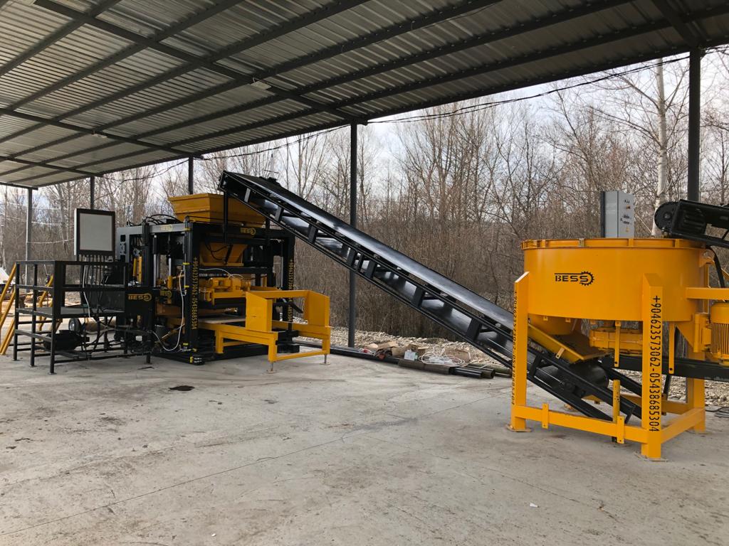 Станок для производства шлакоблоков concrete_block_machine_with_all_equipment.jpg